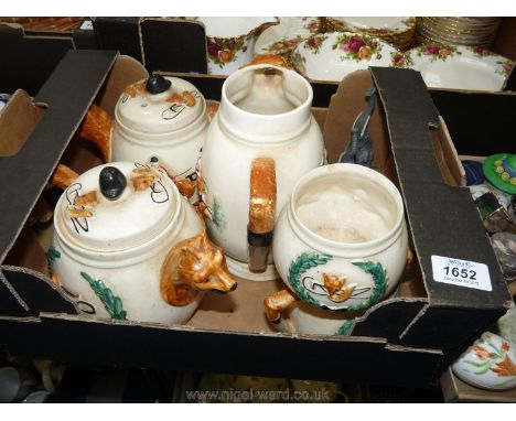 A quantity of hunting theme china including teapots, jug, sugar bowl with fox's head spout, etc