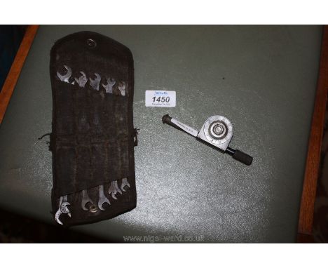 A 16 piece open ended Magneto Spanner set and a revolution counter.