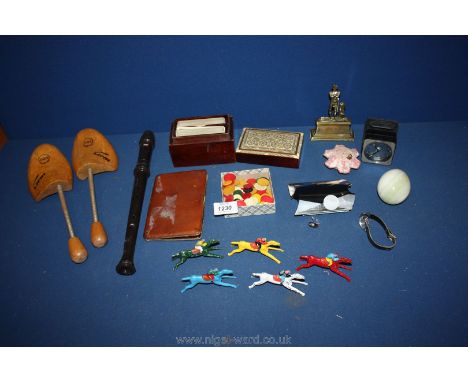 A quantity of miscellaneous including shoe lasts, metal horse and jockey Chad Valley figures, stone egg, an Aulos recorder, e