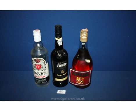 A bottle of Ruby Port, Cossack Vodka and Napoleon Brandy.