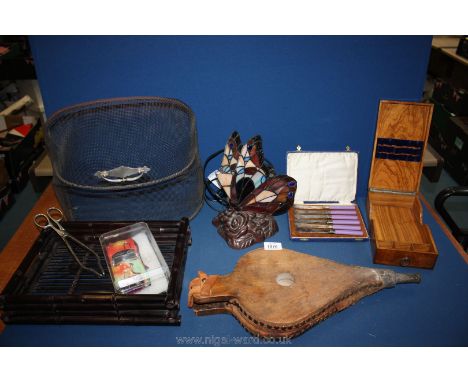 A small fire spit guard, pair of wooden bellows, coloured butterfly lamp a/f, cased set of tea knives, small box, etc.,