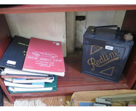 A 'Redline' motoring petrol can, and various Jaguar E-Type Service manuals and parts catalogues 