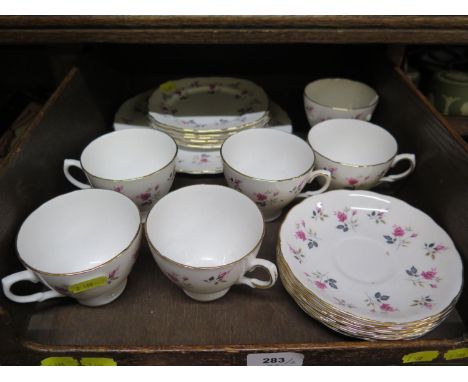 An Edwardian red printed part tea service, with blue foliate design, and a Royal Osborne pink rose design tea set 