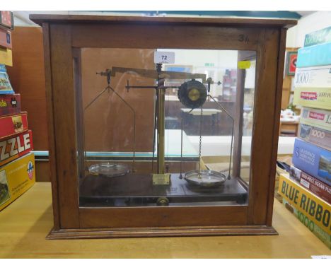 A set of Griffin &amp; George Laboratory scales, 250 gm, in a glass case, 47 cm wide, and an oak cased mantel clock (2) 