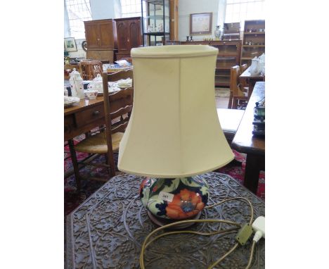 A Moorcroft Pottery table lamp, of baluster form with poppy design, 18.5 cm high 