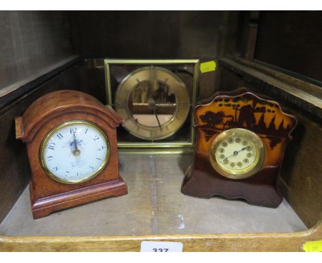 A Smiths electric Art Deco mantel clock with tinted amber glass and two other clocks (3) 