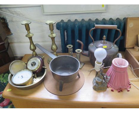 A Victorian brass inkwell in the form of a well, converted to a table lamp, two pairs of brass candlesticks, a copper kettle 