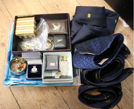 A Jacqmar BOAC design silk scarf, BOAC, Concorde and other aviation ties, and a collection of aviation themed lapel badges an