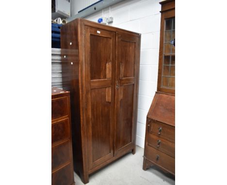 An early 20th Century oak hall robe or wardrobe