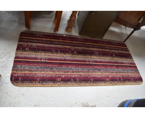 A vintage carpet piece, made into rug size, rounded edges, approx. 192 x 92cm