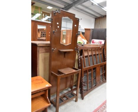 An Edwardian hall way cloak or coat stand with original hooks and mirror back