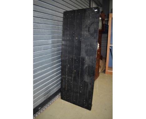 A vintage plank top fold out table