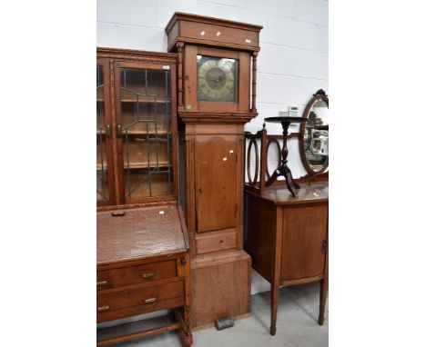 A stripped pine longcase clock having brass dial, 30 hr movement, signed Henry Mason