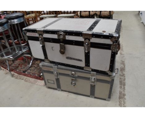 Two vintage flight case style trunks