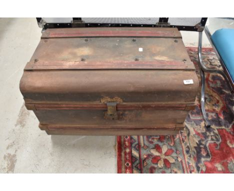 A vintage tin trunk