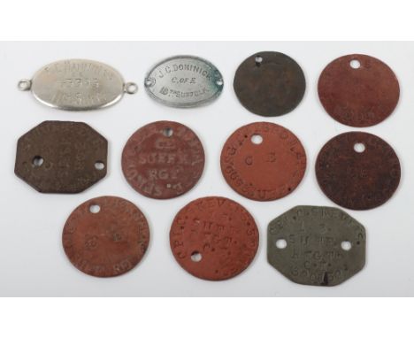 Selection of Identity Discs of Devon Regiment and Suffolk Regiment Interest, consisting of fibre identity disc “12247 C TROUS