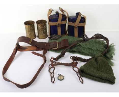 British Equipment Grouping, consisting of two blue enamelled canteens with webbing cradles, Sam Browne belt with cross strap,