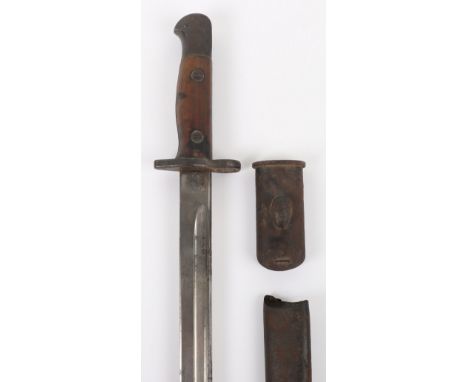 WW1 British 1907 Pattern Bayonet, good untouched example with two piece wooden slab grips. Leather scabbard with loose top mo