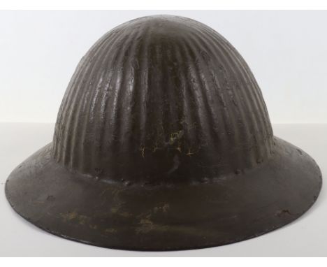 WW1 British Made Mild Steel Combat Helmet, good example retaining much of the original brown over paint combat finish to the 
