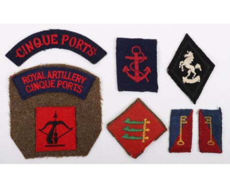 Cloth Insignia of Royal Artillery Interest, including a embroidered Royal Artillery Cinque Ports shoulder title above embroid