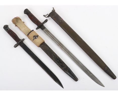 American P-17 Bayonet, with two piece wooden grips, housed in its original leather and steel mounted scabbard with belt fitti