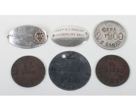 Grouping of New Zealand Regiments Identity Discs, including a sterling silver oval example engraved “CAPT W J RODGER CANTERBU