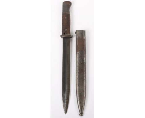 WW2 German K98 Bayonet, well used example with two piece wooden grips. Housed in its steel scabbard. Miss-matched numbers. Bl