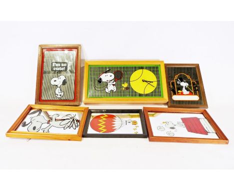 Five vintage Snoopy mirrors and a Snoopy mirrored clock