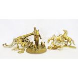 Two boxes of various brassware to include a cannon, various horse sculptures, horse and hounds, etc