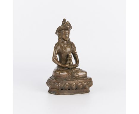 Vintage or antique Tibetan gilt bronze figural sculpture depicting a seated Buddha.Height: 7 in x width: 5 in x depth: 4 in.C