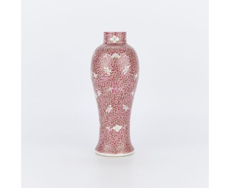 Straits Chinese porcelain baluster vase with rose-colored ground, 19th century.Height: 12 in x diameter: 4 1/2 in.Condition: 