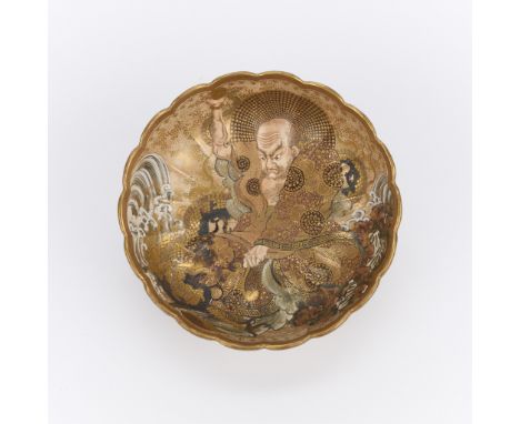Meiji Japanese scalloped ceramic satsuma pottery bowl depicting an immortal along the center, late-19th to early 20th century