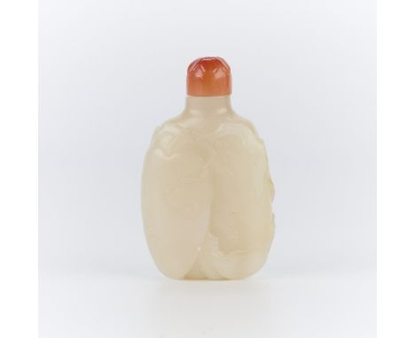 18th century Chinese carved white jade snuff bottle in the form of a peach.Height: 2 1/2 in x width: 1 1/2 in x depth: 1/2 in