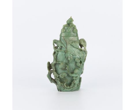 Chinese carved jade urn vase or lidded vessel depicting bird forms.(Incl. lid) height: 9 1/4 in x width: 5 1/4 in x depth: 3 