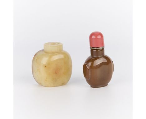 Group of two vintage or antique Chinese hardstone snuff bottles, 19th century. One snuff bottle of a rich, earthy hue; the se