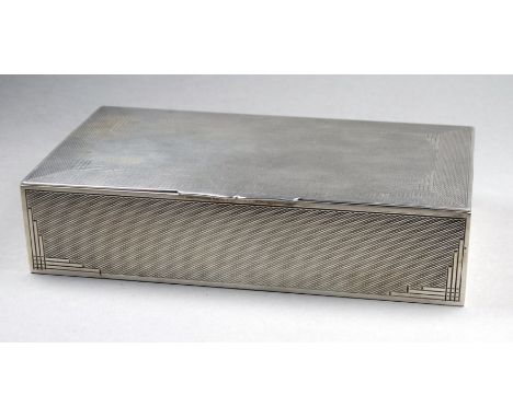 A rectangular silver cigarette box - Birmingham 1935, sponsor's mark for John Rose, engine turned in an Art Deco style, beari