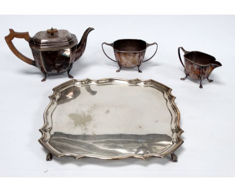 A 20th century three piece silver plated tea service - of rectangular form with canted corners and fruitwood fittings, togeth