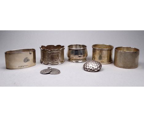 A silver napkin ring - Birmingham 1953, together with three other napkin rings, a cruet (lacking liner), three Indian coins a