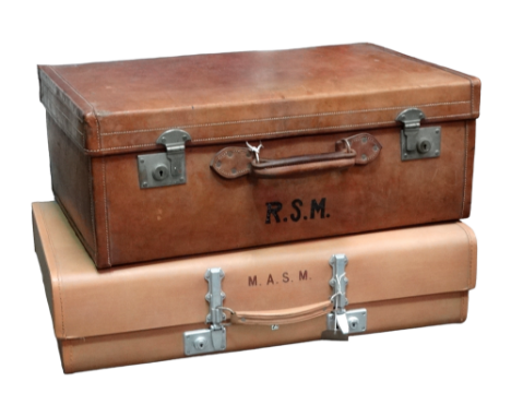 An early 20th century tan leather travelling trunk - marked with ownership initials and with nickel plated locks, width 70cm,