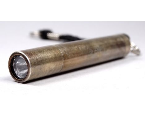 A silver cased pen light torch - London 1997, length 8cm. 