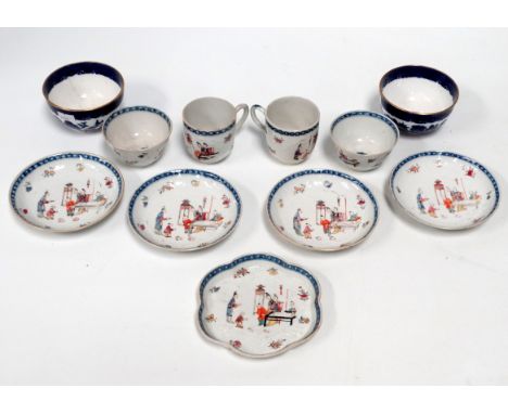 A pair of 19th century Samson style teacups and saucers - relief moulded and decorated with oriental scenes, together with a 
