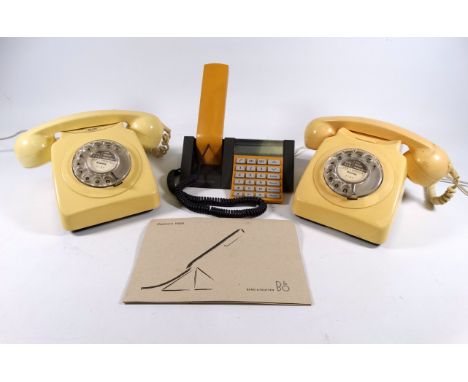 A British Telecom 700 Series cream telephone - together with another and a Bang &amp; Olufsen BeoCom 1600 telephone with manu