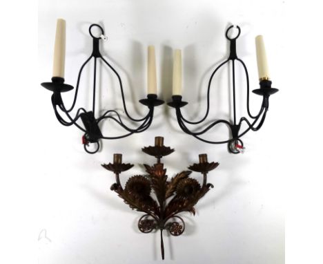 A pair of contemporary wrought steel wall lights - twin branch, height 36cm, together with another gilt painted three branch 
