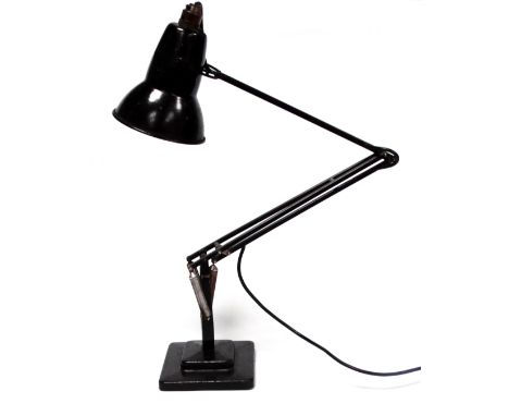 A Herbert Terry anglepoise lamp - black painted on a stepped square base.