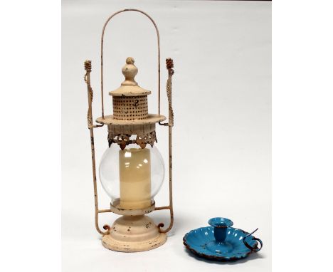 A white painted candle lantern - height 51cm, together with a blue enamel chamberstick.