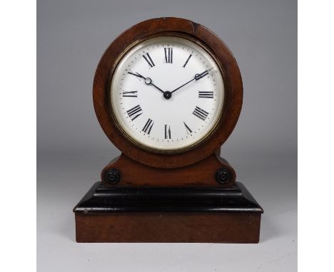 A late 19th century mahogany cased mantel time piece - the white enamel dial set out in Roman numerals, fitted with a French 