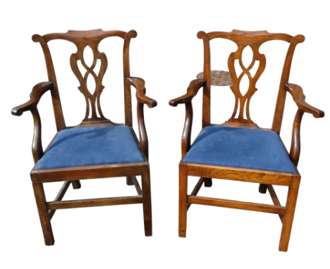 A pair of Georgian ash Chippendale style open armchairs - with pierced vase shaped splats and slip-in seats on square legs jo