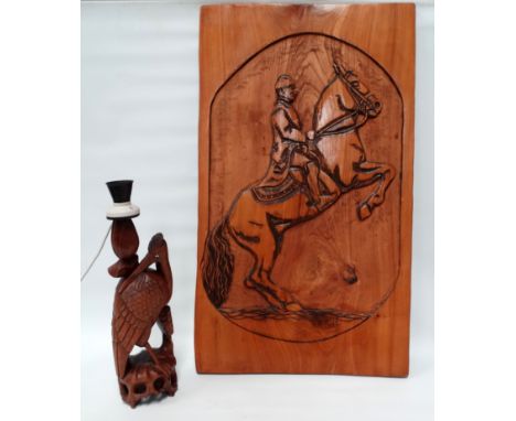 G.A. Solf, a mid 20th century carved elm panel - a Viennese School horseman, signed lower right, 93 x 58cm, together with a c
