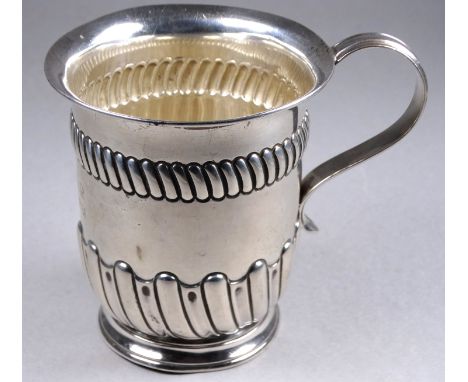 A Victorian silver mug - Sheffield 1890, Harrison Brothers &amp; Howson, tulip shaped and part gadrooned, bearing initials an