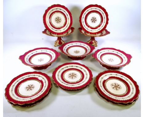 A 19th century fruit service - possibly Swansea, gilt decorated with foliate bands within puce borders, comprising two compor